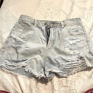 light wash ripped jean shorts